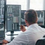 ASX Appoints Insider Darren Yip as Interim Chief